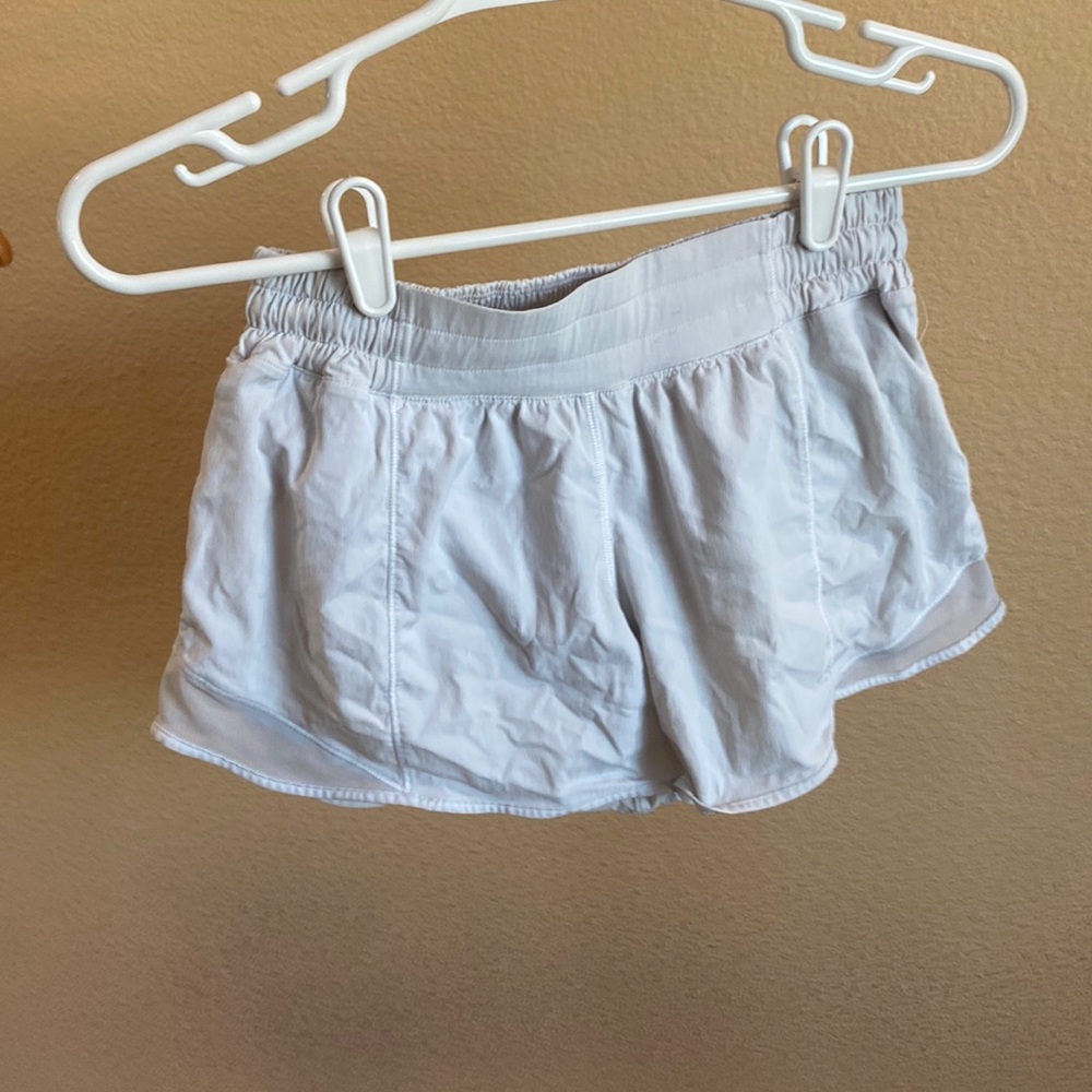 White Lululemon running shorts